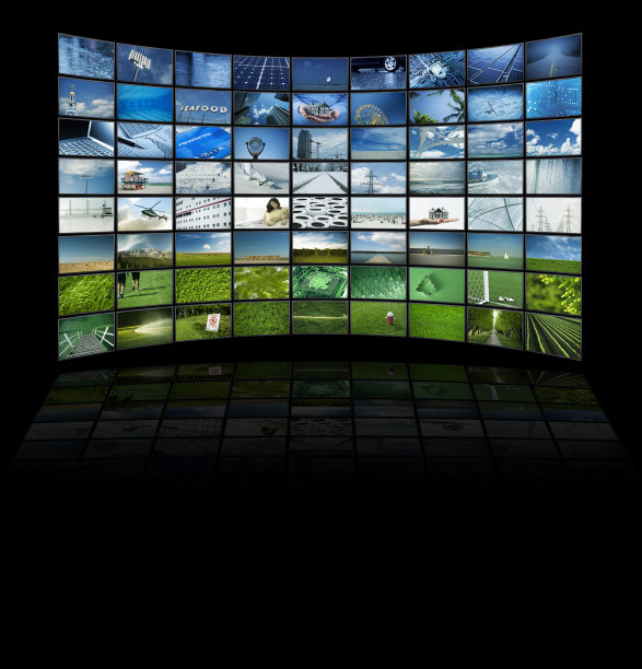 huge wall of videos displayed on plasma and lcd televisions